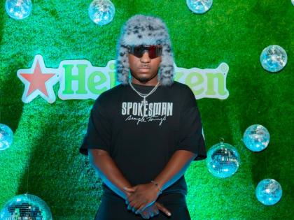 Dr George Scarlett gives Euro energy in a fur-style trapper hat with ear flaps.