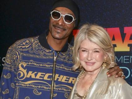 Snoop Dogg (left) and Martha Stewart attend the Footwear News Achievement Awards at Cipriani South Street on Wednesday, November 29, 2023, in New York. 