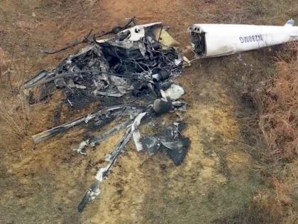 Debris from a helicopter is shown after two helicopters crashed in Hammonton, N.J., on Sunday, December 28, 2025. (WPVI-TV/6ABC via AP)