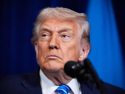 President Donald Trump attends a joint news conference with Ukraine's President Volodymyr Zelenskyy following a meeting at Trump's Mar-a-Lago club, Sunday, December 28, 2025, in Palm Beach, Fla. (AP Photo/Alex Brandon)