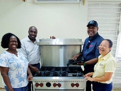 From left: Nadine Bell, dietitian at St Ann’s Bay Hospital; CEO Dennis Morgan; Rodroy Thomas, executive chef; and Lyndsay Isaacs, regional public relations manager at Sandals Ochi, during the handover of a restaurant range stove donated by the Sandals Fo