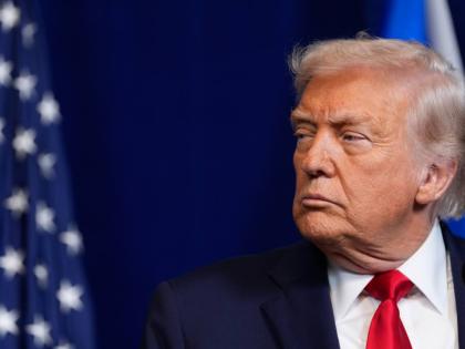 United States President Donald Trump listens during a news conference with Israel's Prime Minister Benjamin Netanyahu at Mar-a-Lago on December 29, 2025, in Palm Beach, Florida. 