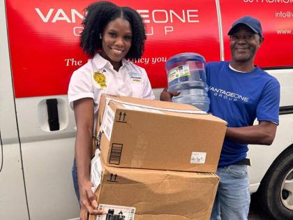 Lifespan Brand Manager Karonna Atkins (left) shares a moment with Glenville McDonald of partner hosts Vantage One Group during a recent outreach. The collaboration aims to uplift residents through health checks, mental health support, games, entertainment,