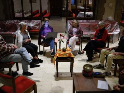 AP 
Prayers are shared following an interfaith meditation practice at All Saints Episcopal Church in Pasadena, California last month.