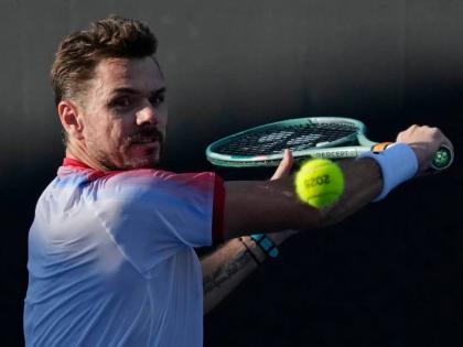 
Stan Wawrinka, of Switzerland, plays a backhand return to Lorenzo Sonego, of Italy, during a first-round match at the Australian Open tennis championship in Melbourne, Australia, on January 14, 2025. 