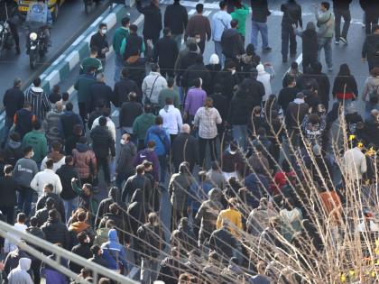 Protesters march in downtown Tehran, Iran.