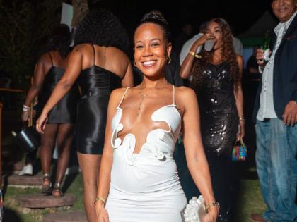 Veterinarian Dr Briana Schwapp Hayle in a sculpted white Christopher Esber dress.