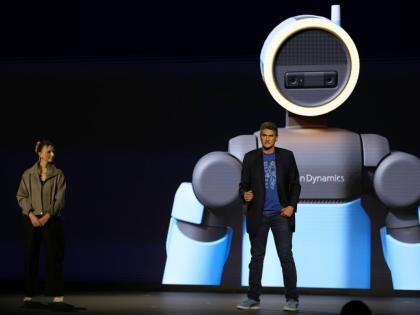 Humanoid application product lead at Boston Dynamics, Aya Durbin (left), and Vice-President and General Manager of Atlas at Boston Dynamics, Zachary Jackowski, talk during a Hyundai and Boston Dynamics news conference ahead of the CES tech show on Monday, 