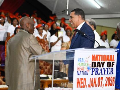 Prime Minister Dr Andrew Holness (right) greets Founder of Power of Faith Ministries International, Bishop Dr Delford Davis, during the ‘Heal the Family, Heal the Nation’ Day of Prayer service on Wednesday, January 7, 2026. The service was held at the 