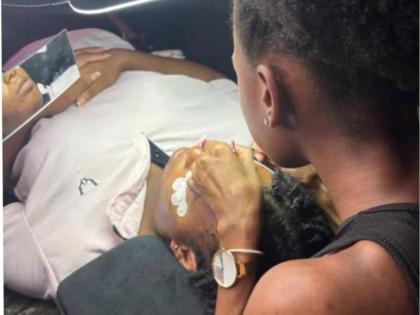 Kyra Mills applies cluster lashes, among the services offered at The Skin Lab Beauty Bar.