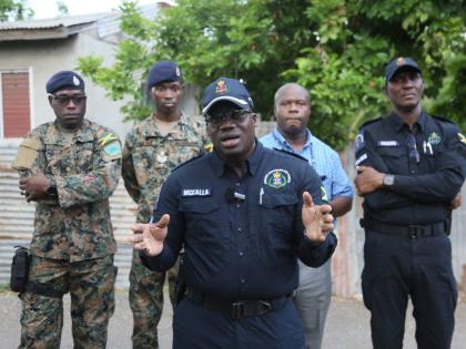 Senior Superintendent of Police Shane McCalla, commanding officer for the Clarendon division, makes a point.