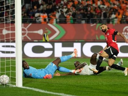 
Egypt’s Mohamed Salah (right) scores his side’s third goal during the Africa Cup of Nations quarterfinal football match against Ivory Coast, in Agadir, Morocco, yesterday.