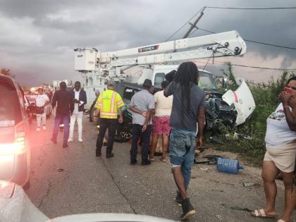 First responders at the site of a two-vehicle collision on the Font Hill main road in St Elizabeth that claimed four lives on January 10, 2026. 