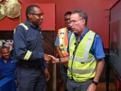 Minister of Energy Daryl Vaz (right) greets President and Chief Executive Officer of the Jamaica Public Service Company Hugh Grant, during a tour of the company’s Incident Command Centre in Westmoreland on January 8, 2026.

