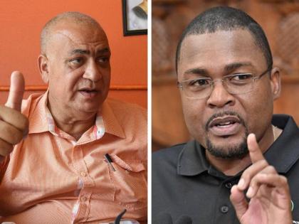 Robert Morgan, minister with responsibility for works (right) and Opposition Spokesman on Roads and Works Richard Azan. 