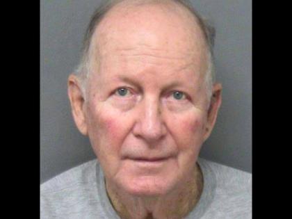 This booking photo released by the Clark Country, Ohio, Sheriff’s Office, shows William Brock, an Ohio man who authorities say fatally shot an Uber driver who he thought was trying to rob him after scam phone calls deceived them both.