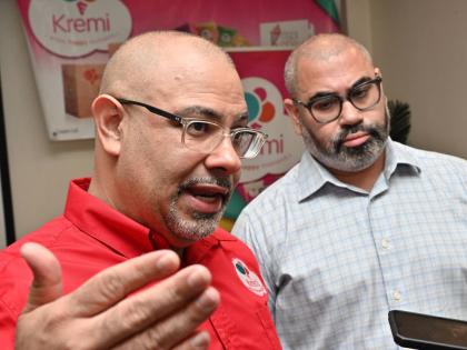 
Christopher Clarke,(left) Executive Director and CEO of Caribbean Cream Ltd (Kremi); and Dr. Matthew Clarke, Non-Executive Director and Chairman of Caribbean Cream Ltd (Kremi) speaks at the Caribbean Cream Ltd (Kremi) ‘Building on a Solid Foundation’ 