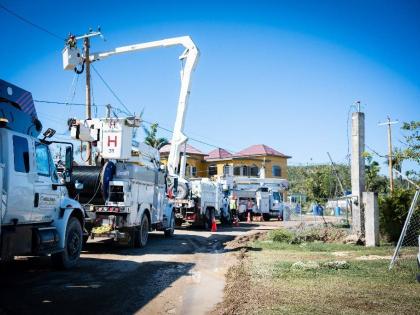 Several bucket trucks seen on Carawina Road in Westmoreland as JPS continued several kilometres of repair work along the power line section leading to the National Water Commission’s Roaring River Pump. The energization of the lines aims to restore water