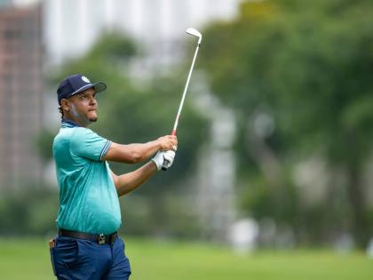 Zandre Roye watches the ball closely after making a shot on the Lima Golf Club during the first round of the 11th Latin America Amateur Golf Championship in Peru on Thursday.