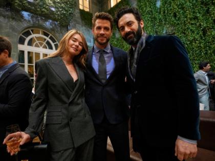 Liam Hemsworth (centre) is flanked by his girlfriend, model, Gabriella Brooks, and Morgan Spector (right), as they attend Ralph Laurent Fall/Winter 2026-2027 Men’s fashion show presented in Milan, Italy.