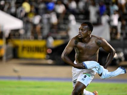 Nicholas Hamilton celebrates scoring the winning penalty in the Jamaica Premier League final for Cavalier against Mount Pleasant Football Academy on May 19, 2024 at the National Stadium in Kingston.