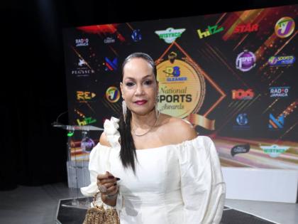 Polished to perfection in this all-white set is local fashion designer, Valerie Robinson. 