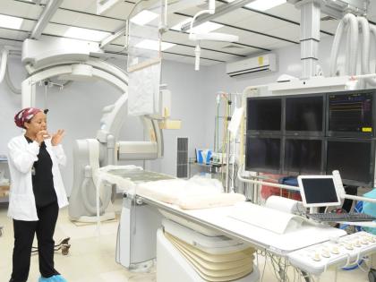 Dr Cleopatra Patterson, paediatric cardiac anaesthetist and intensivist at the Bustamante Hospital for Children, showcases a procedure room, designed for minimally invasive, cardiac procedures during a tour of the facility by a 16-member volunteer team led