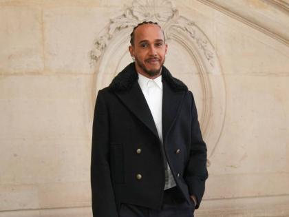 British Formula 1 driver Lewis Hamilton proves that the design is in the details, looking sharp in head-to-toe Dior.