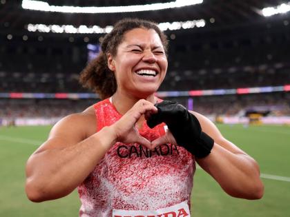 Canada’s Camryn Rogers celebrates winning gold in the Hammer Throw at the World Athletics Championships in Tokyo last year. The glove on her hand was donated to the Museum of World Athletics yesterday.
