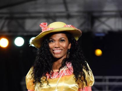 Liane Chung in Quindell Ferguson. Quindell Costume will host a fashion show at Salute to Kingston this monthend.