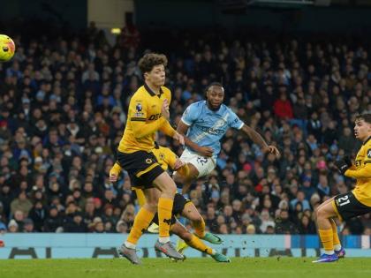 Manchester City’s Antoine Semenyo (centre) shoots and hits the bar during an English Premier League football match against Wolverhampton Wanderers in Manchester, England, yesterday.