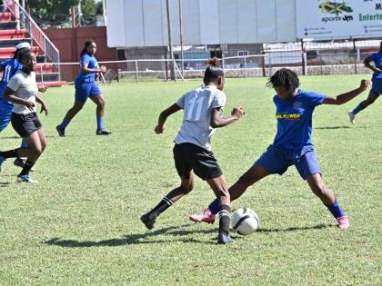 Midfield action from one of the matches in the annual Tarania ‘Plum Plum’ Clarke Girl Power Invitational tournament held last Friday at the Anthony Spaulding Sports Complex in Arnett Gardens, Kingston.