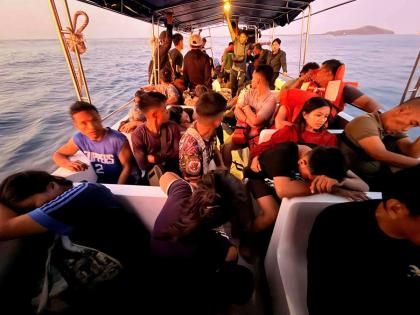 Rescued passengers from M/V Trisha Kerstin, 3 an inter-island cargo and passenger ferry that sank, on a boat around waters of Isabela City, Basilan Province, Philippines on Monday, January 26, 2026. (Kagawad Gamar "Gams" Alih via AP)