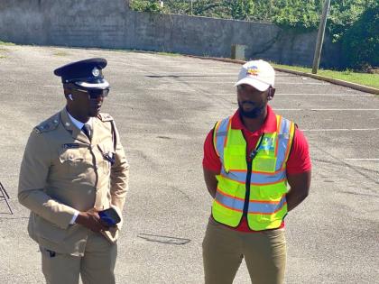Senior Superintendent of Police Eron Samuels (left), commanding officer in charge of the St James Police Division, and Dervon McKellop, national drone soccer coach and Drones in Schools programme director, in conversation during the launch of a three-day d