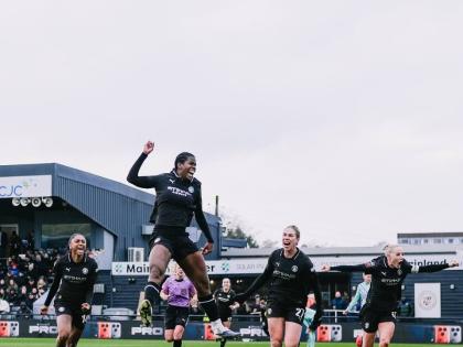 Manchester City’s Khadija Shaw celebrates scoring the winning goal against the London City Lionesses at the Copperjax Community Stadium on Sunday.