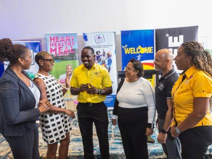Kurt Dunn (3rd left), CEO, BodybyKurt FitFest Party & Expo, shares a photo op with  Juliet Cuthbert Flynn (second left), state minister for National Security & Peace, and sponsors (from left) Diahann Gordon Harrison, Children’s Advocate; Hillary Coulton,