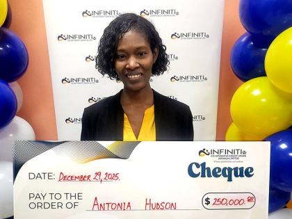 Infiniti Co-operative Credit Union’s first-place winner Antonia Hudson holds her presentation cheque, a share of the $500,000 Merry Money Promotion prize.