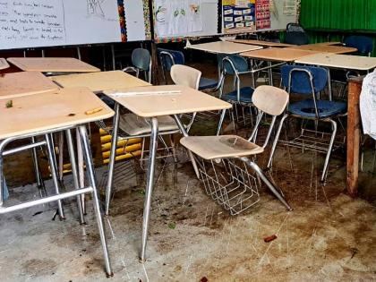 Hurricane Melissa damage to a classroom at a school.