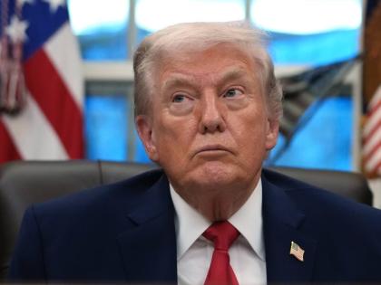 President Donald Trump listens during an event on addiction recovery in the Oval Office of the White House, Thursday, January 29, 2026, in Washington. (AP Photo/Allison Robbert)