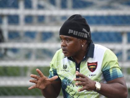 Football coach Hector Wright