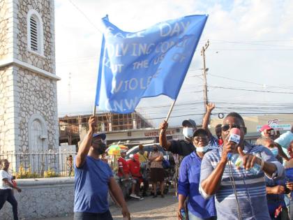 
This 2022 photo shows Clarendon Neighbourhood Watch-JCF Peace March which was organised under the theme ‘Resolving Conflict Without The Use Of Violence’.