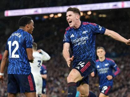 
Arsenal’s Viktor Gyokeres (right) celebrates scoring his side’s third goal in an English Premier League football game against Leeds United with teammate Jurrien Timber in Leeds, England, yesterday.