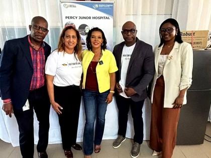 Minister without portfolio in the Office of the Prime Minister with responsibility for Efficiency, Innovation and Digital Transformation, Ambassador Audrey Marks (centre), shares a moment with (from left) Chief Executive Officer of Percy Junor Hospital, Ca