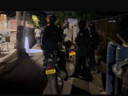 Police at the scene of a shooting along Chisholm Avenue in St Andrew on February 6.