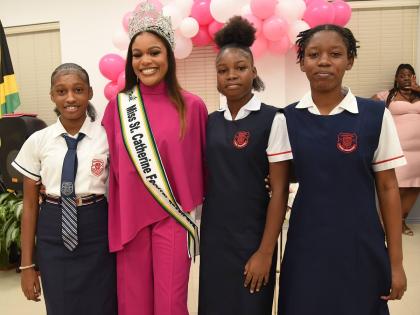 Afiya Birch-Gentles (second left) poses with a few students from Bridgeport High School (from left) Kaycia Harriott, Dejanique Campbell, and Jayda Campbell, during the project launch of Beauty Beyond Brushes held last Friday at the Portmore City Municipali