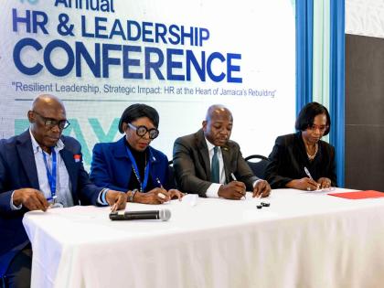 Minister of Labour and Social Security, Pearnel Charles Jr. (2nd right); Acting Permanent Secretary in the minstry, Dione Jennings (right); President of the Human Resource Management Association of Jamaica (HRMAJ), Dr Cassida Jones Johnson (second left) an