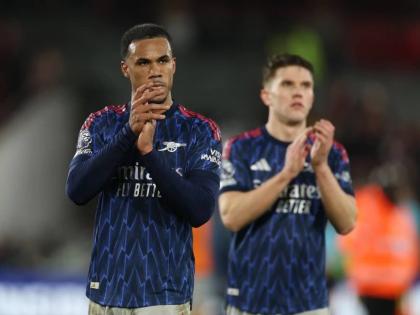Arsenal’s Gabriel (left) and Viktor Gyoekeres leave the pitch after the English Premier League match between Brentford and Arsenal in London yesterday.