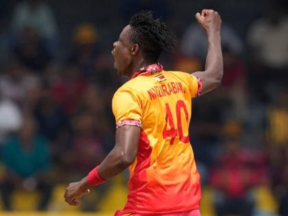 Zimbabwe’s Blessing Muzarabani celebrates the wicket of Australia’s Tim David during the T20 World Cup cricket match between Australia and Zimbabwe in Colombo, Sri Lanka, yesterday.