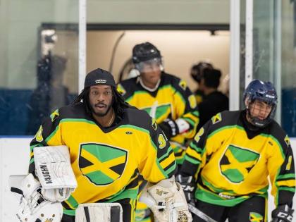 Giovani Smith leads Jamaica’s ice hockey team out on to the rink during a Challenger Series game played across Chicago, New York, and Toronto last year.