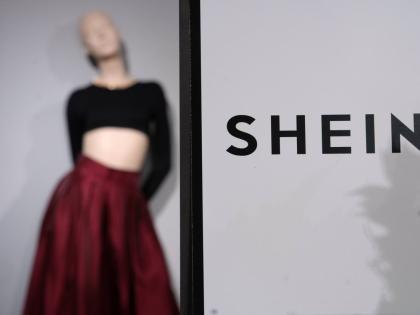 Clothes by Chinese company Shein are seen in the BHV (Bazar de l'Hotel de Ville) department store, Tuesday, November 4, 2025 in Paris. (AP Photo/Aurelien Morissard, File)